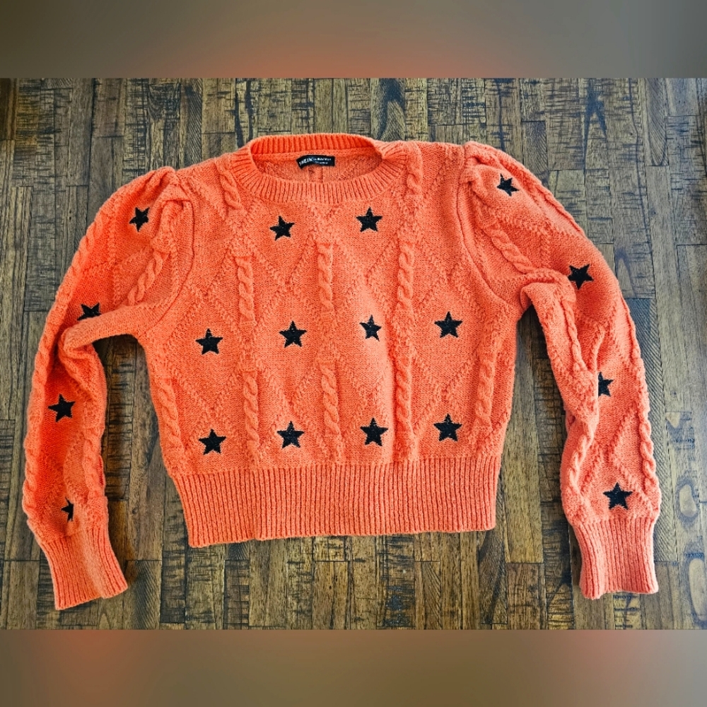 Orange Cable Knit Sweater with Black Stars